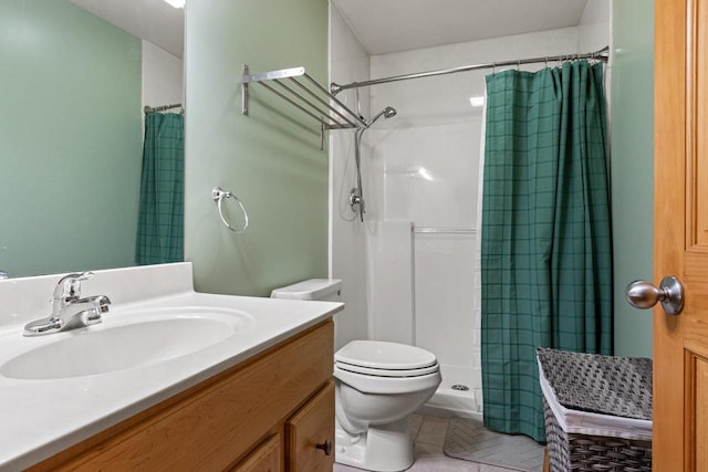 1680 N Aurora Ln, Nekoosa, WI 54457 - full bathroom featuring tile patterned flooring, vanity, a shower stall, and toilet