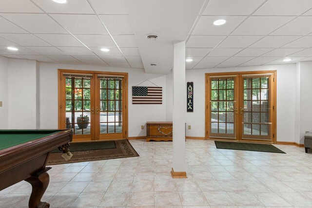 1680 N Aurora Ln, Nekoosa, WI 54457 - interior space featuring plenty of natural light, french doors, baseboards, and a drop ceiling