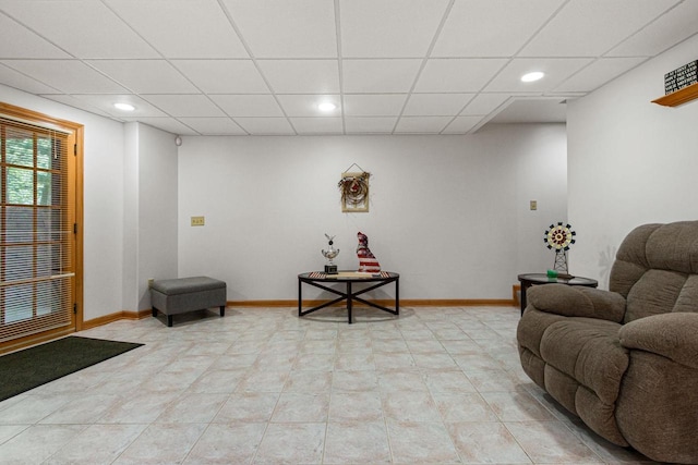 1680 N Aurora Ln, Nekoosa, WI 54457 - living area featuring recessed lighting, a paneled ceiling, and baseboards