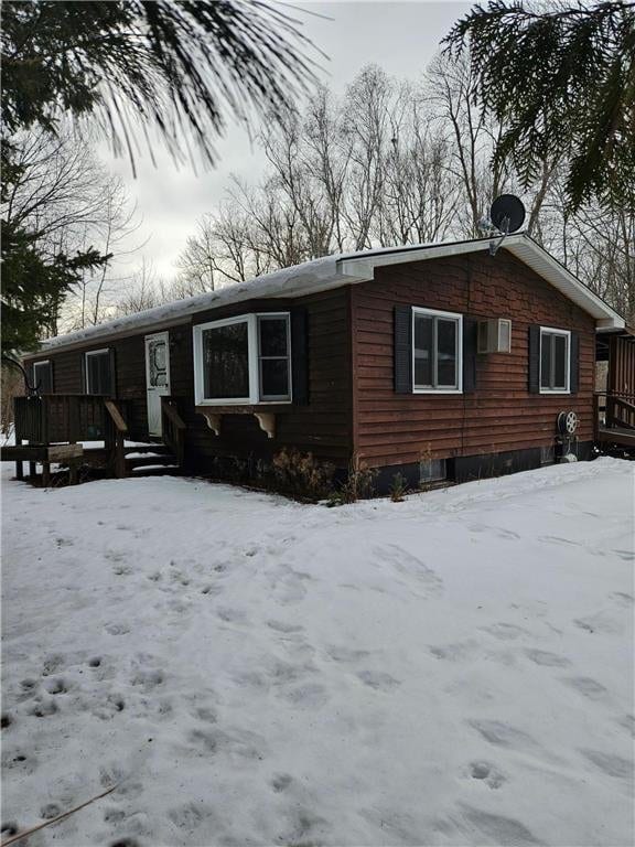 view of front of house with a wooden deck