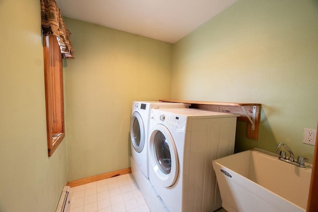 laundry room featuring washer and clothes dryer, a sink, light tile patterned floors, baseboards, and laundry area