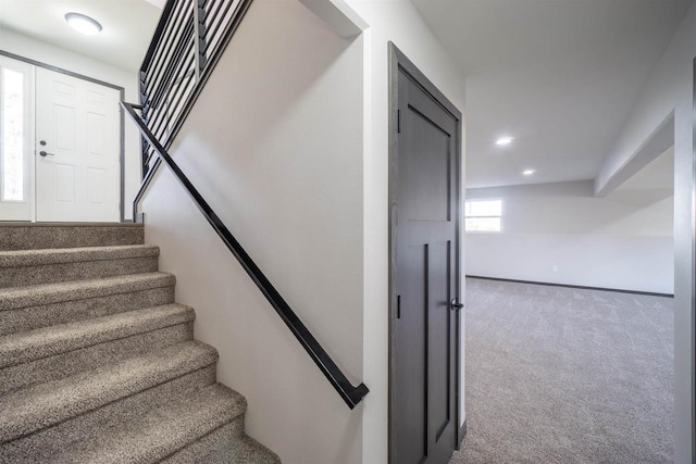 stairway featuring recessed lighting and carpet floors