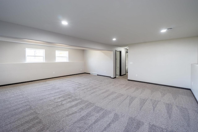 interior space with recessed lighting, carpet, and baseboards