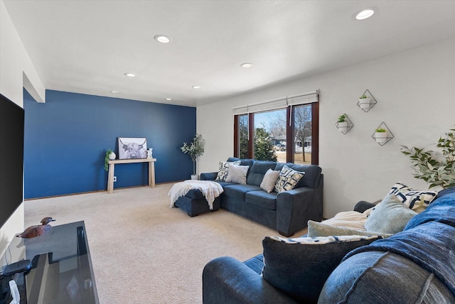 carpeted living area featuring recessed lighting