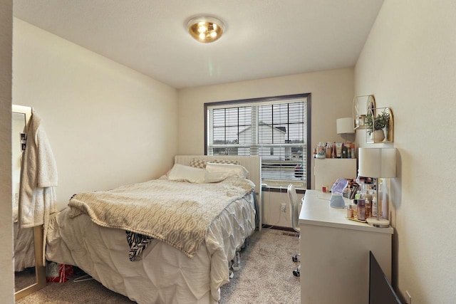 bedroom with light carpet