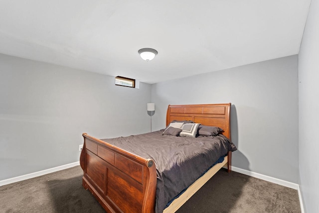 bedroom featuring carpet flooring and baseboards