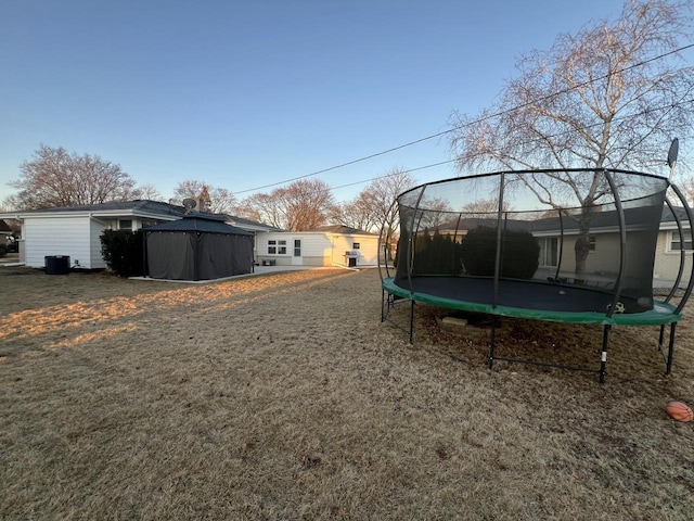 view of yard featuring a trampoline