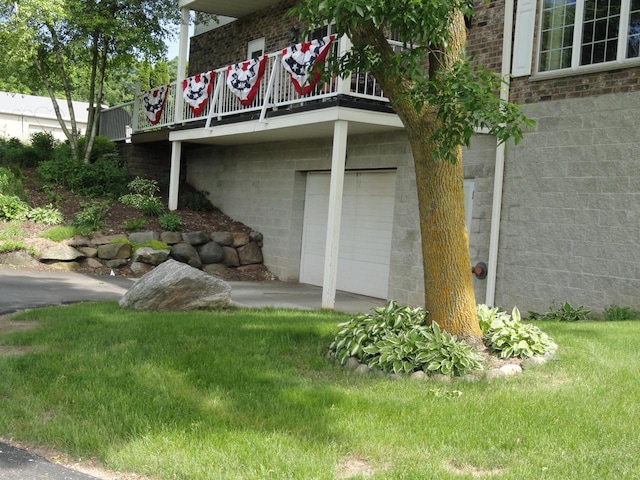 view of home's exterior with a yard