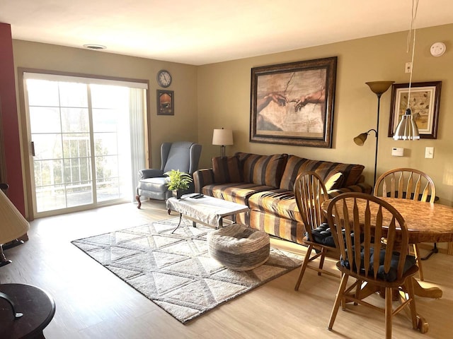 living room with light wood-style floors