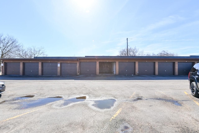 garage with uncovered parking