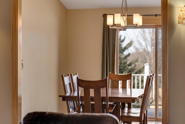 dining room with a chandelier