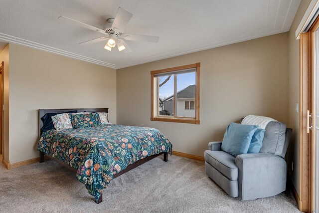 bedroom featuring carpet flooring, a ceiling fan, and baseboards