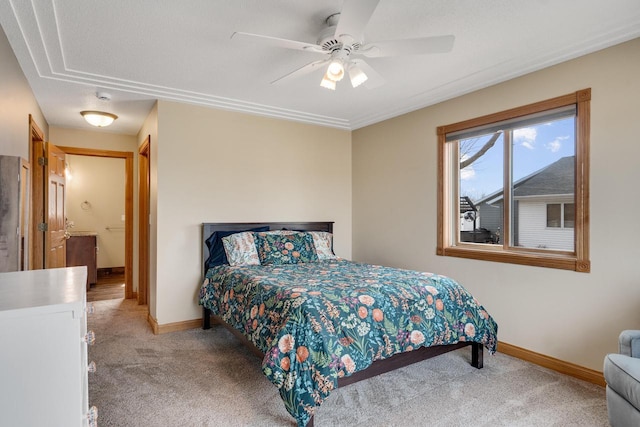 carpeted bedroom with baseboards and ceiling fan