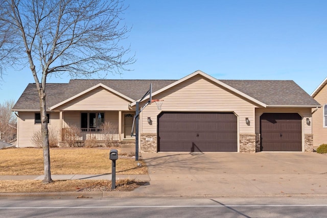 single story home featuring brick siding, a shingled roof, a porch, concrete driveway, and an attached garage