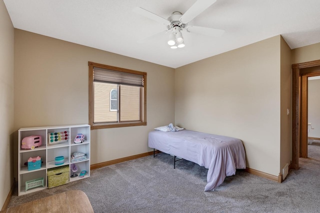 bedroom featuring baseboards, carpet, and a ceiling fan