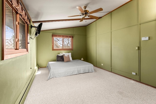 bedroom with vaulted ceiling, carpet flooring, a ceiling fan, and baseboard heating