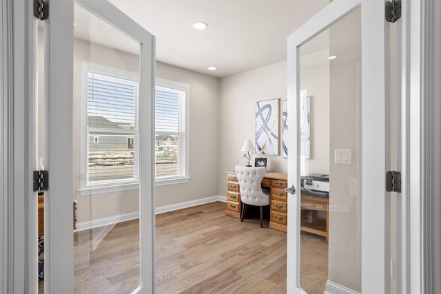 office area featuring recessed lighting, light wood-type flooring, and baseboards