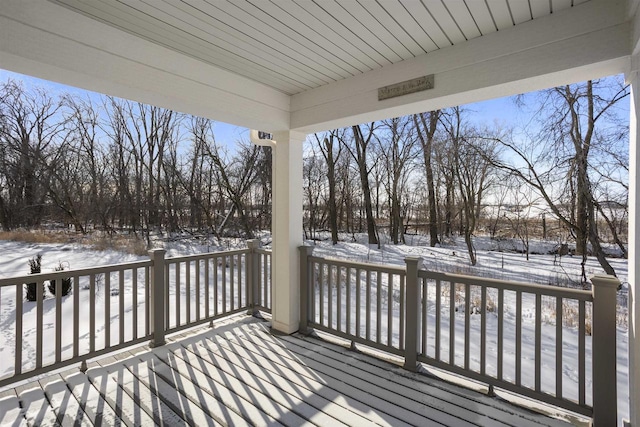 view of snow covered deck