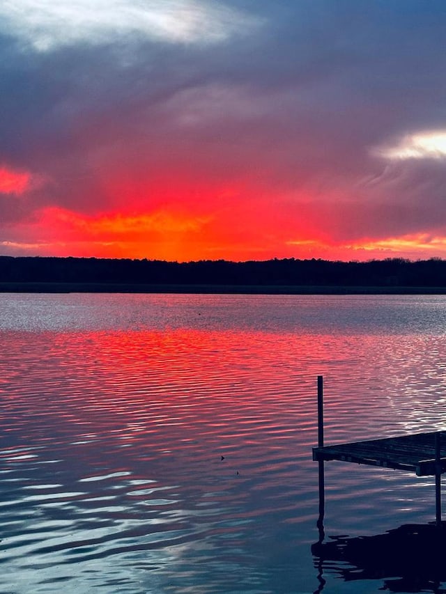 property view of water featuring a dock