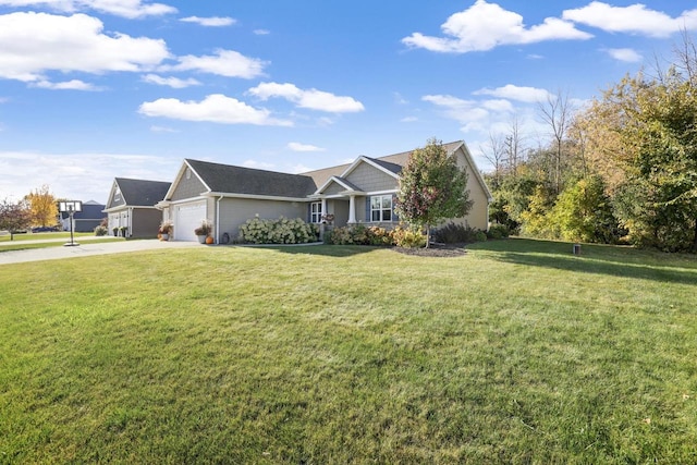 view of front of property with a front yard, an attached garage, and concrete driveway