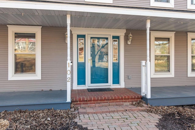 doorway to property featuring a porch