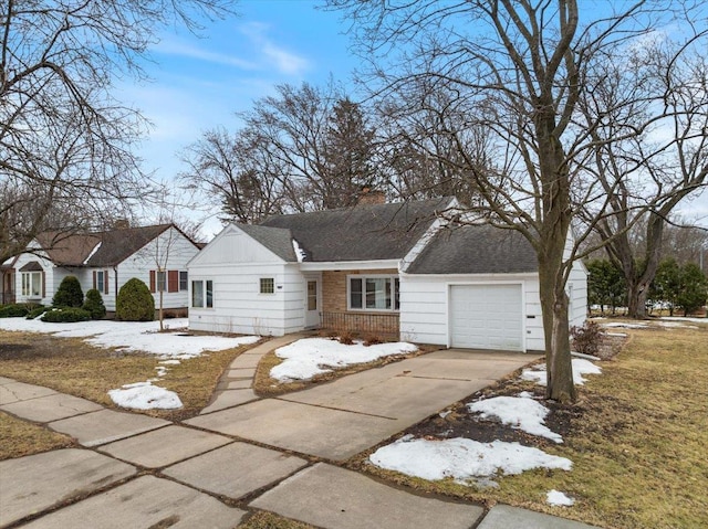 ranch-style house with roof with shingles, concrete driveway, a garage, brick siding, and a chimney