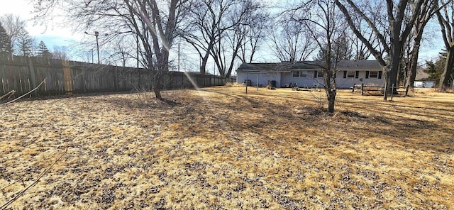 view of yard featuring fence