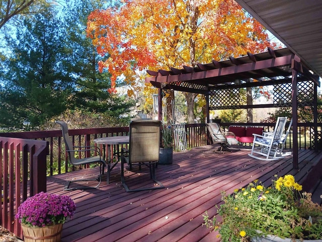 wooden deck with a pergola