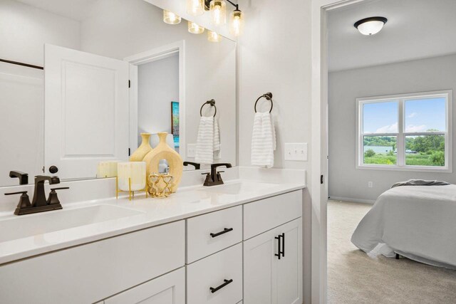 full bath with double vanity and a sink