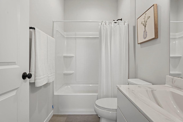 bathroom featuring vanity, toilet, and shower / bathtub combination with curtain