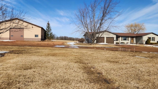 view of yard with an attached garage