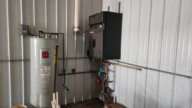 utility room with water heater