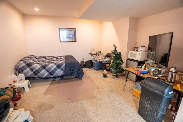 bedroom featuring recessed lighting and carpet floors