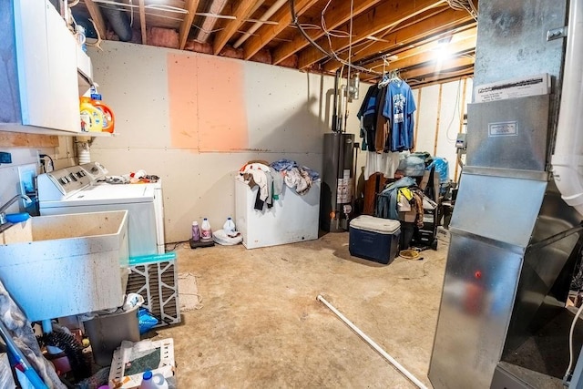 unfinished below grade area with gas water heater, heating unit, washing machine and dryer, and a sink