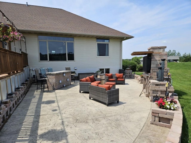 view of patio / terrace featuring outdoor lounge area and outdoor dry bar