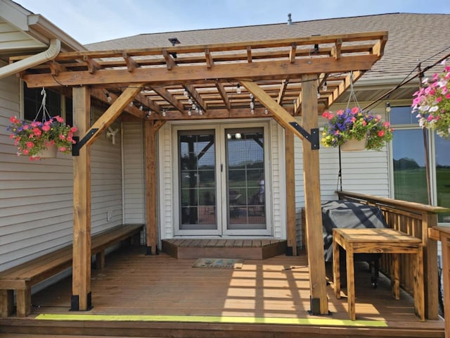 wooden deck with a pergola