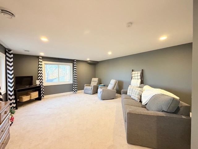 carpeted living room featuring recessed lighting and baseboards