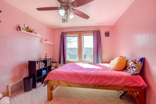 carpeted bedroom with visible vents and ceiling fan