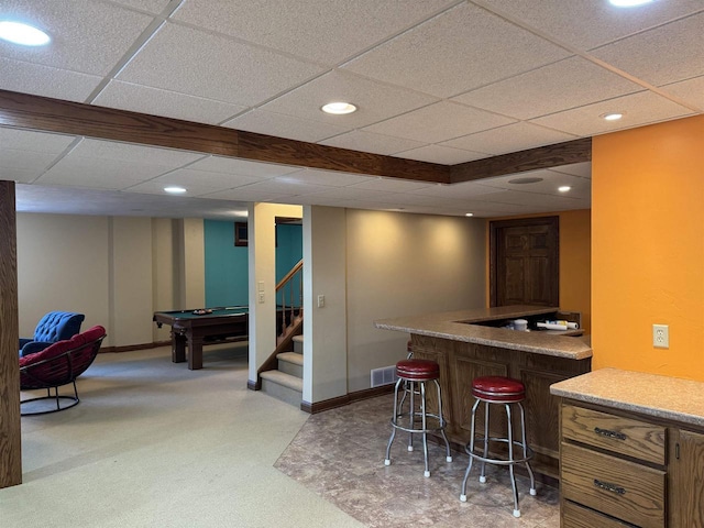 bar with recessed lighting, baseboards, and indoor bar