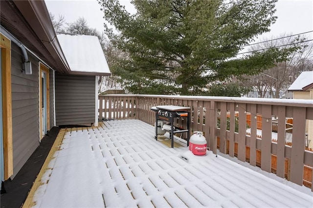 view of snow covered deck