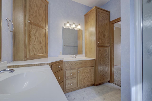 full bath with tile patterned floors and vanity