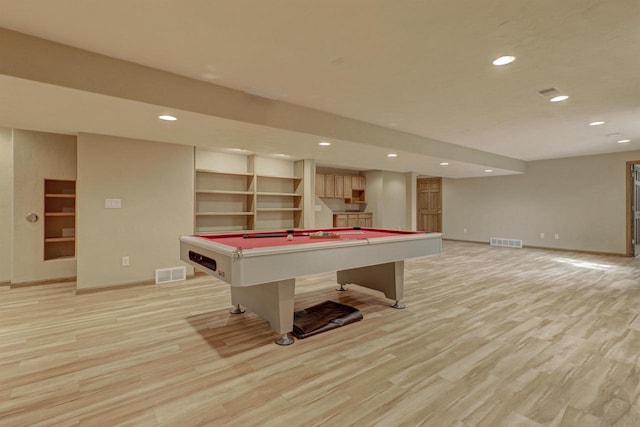 rec room with recessed lighting, visible vents, and light wood finished floors