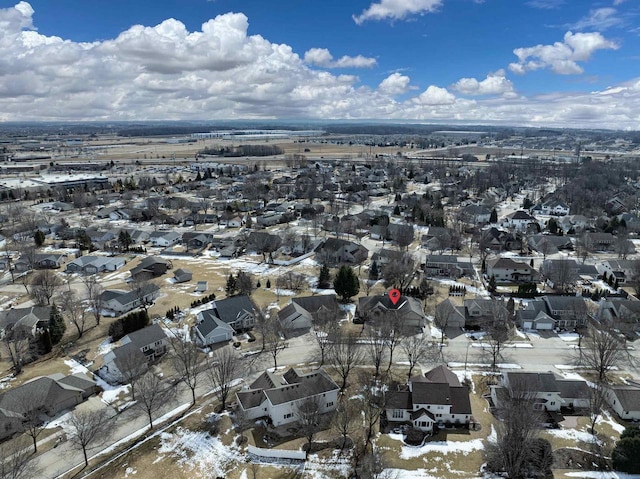 birds eye view of property with a residential view