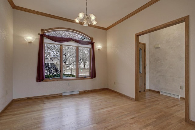 spare room featuring visible vents, light wood-style floors, crown molding, baseboard heating, and a chandelier