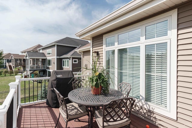 784 Westbridge Trl, Waunakee, WI 53597 - wooden terrace featuring area for grilling and a residential view