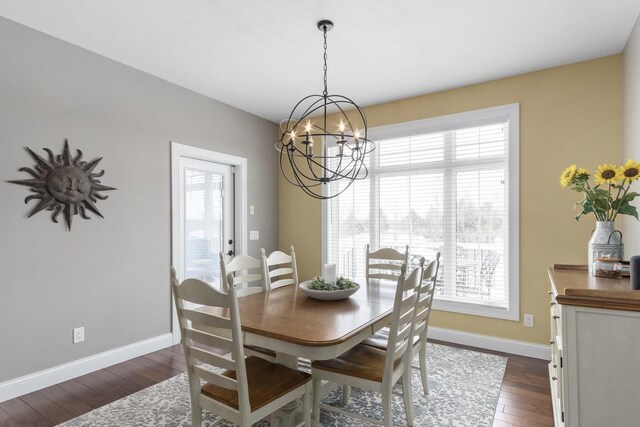 784 Westbridge Trl, Waunakee, WI 53597 - dining area with baseboards, plenty of natural light, a notable chandelier, and dark wood finished floors