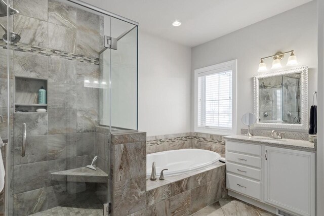 784 Westbridge Trl, Waunakee, WI 53597 - full bath with a garden tub, a stall shower, and vanity