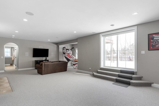 784 Westbridge Trl, Waunakee, WI 53597 - living area with arched walkways, recessed lighting, baseboards, and carpet