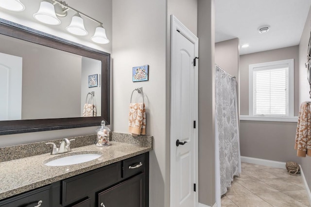 784 Westbridge Trl, Waunakee, WI 53597 - bathroom featuring baseboards, vanity, and tile patterned flooring