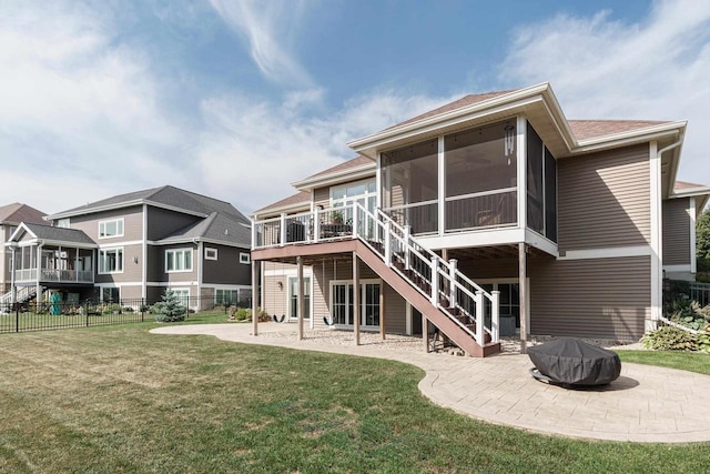 784 Westbridge Trl, Waunakee, WI 53597 - back of house featuring a lawn, a patio, fence, a sunroom, and stairs